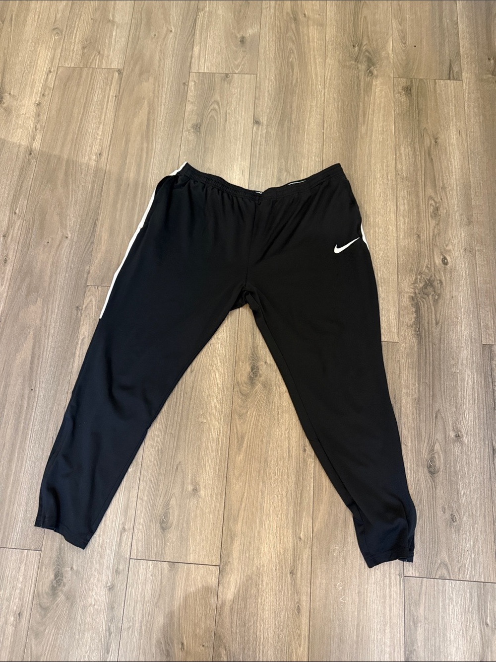 NikeBlack Joggers with White Swoosh and Side Stripe